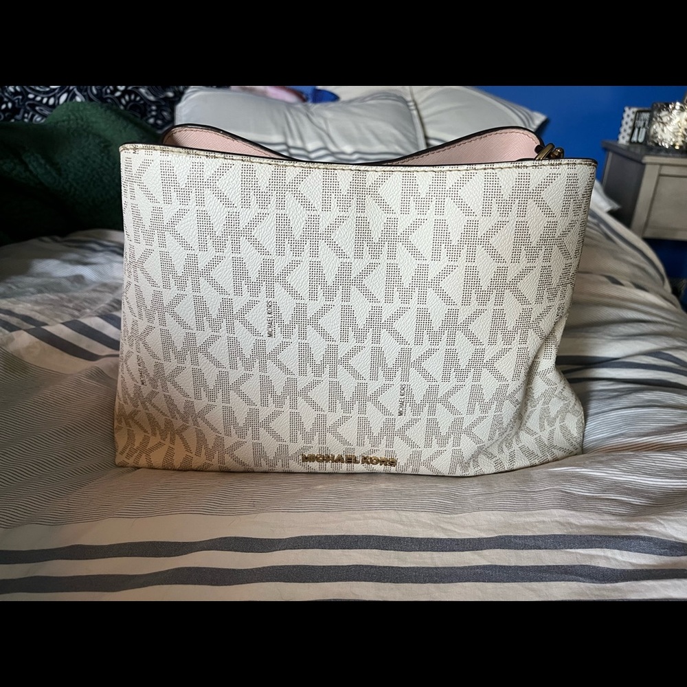 White and pink MK purse